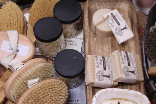 Various spa products like bath salts, homemade soaps and exfoliating brushes
